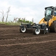 New Power Rake moving in a field,Up close of new Virnig Power Rake in field